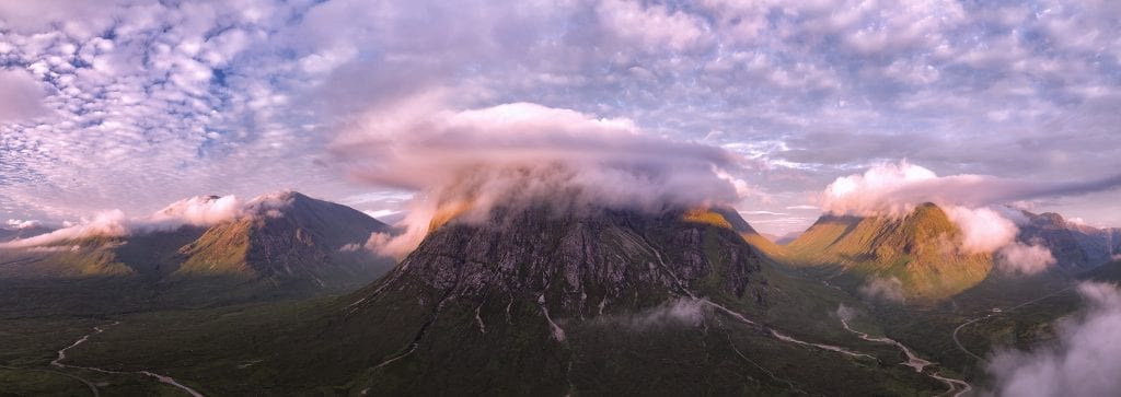 The mountains of Glen Coe at first light, cloud on the tops.