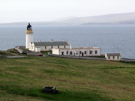 Bressay Lighthouse and its cottages above Bressay Sound.