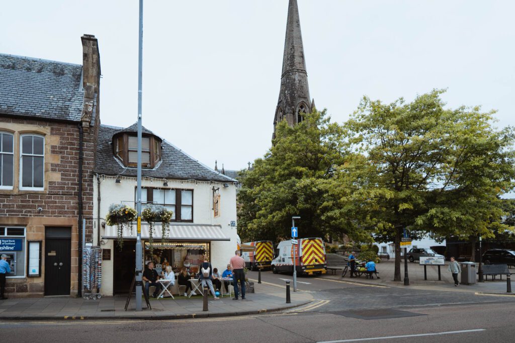 Ancaster Square, its spire and cafés.
