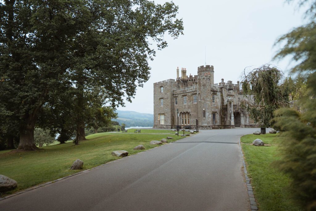 The drive through the park to Balloch Castle, the loch glimpsed beyond.