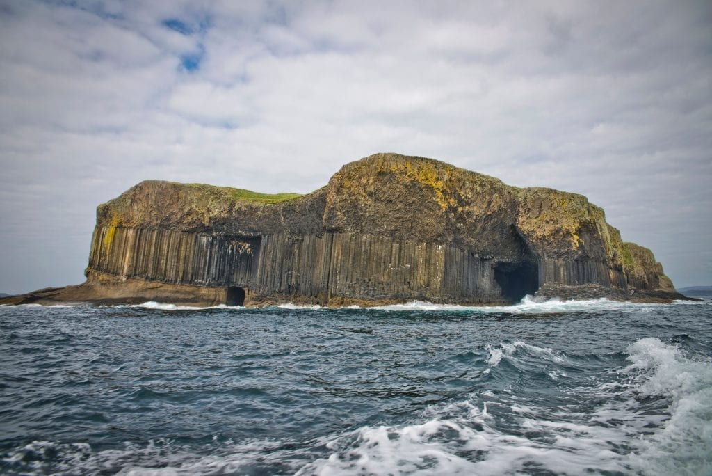 Staffa's columned cliffs from a boat.