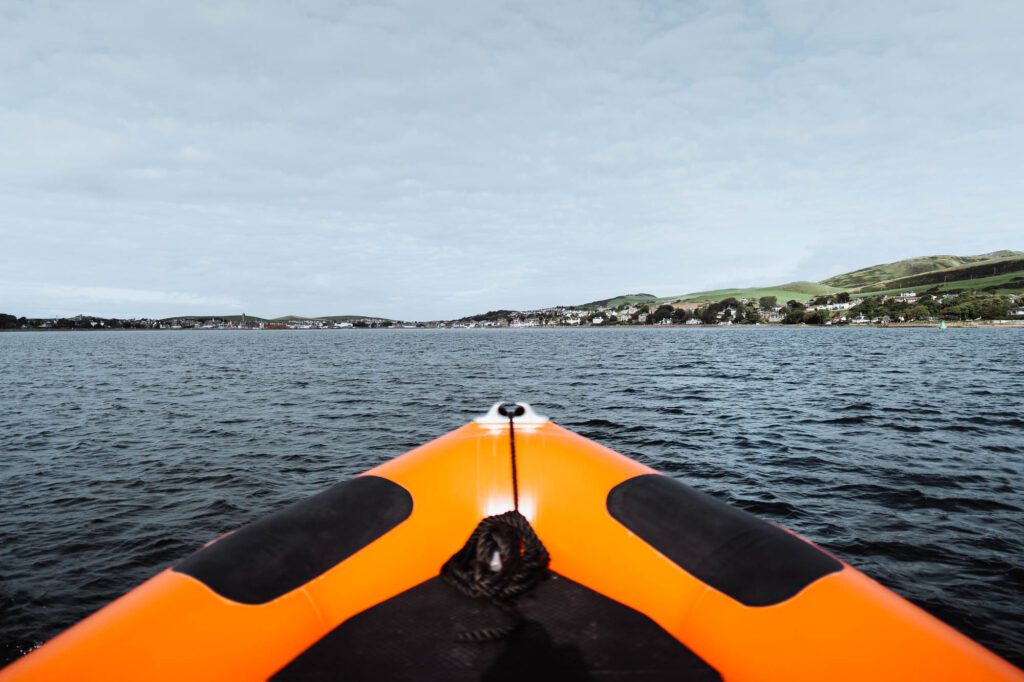 Heading out across Campbeltown Loch towards Davaar by boat.