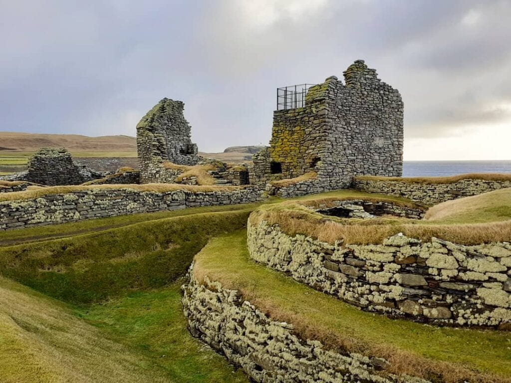 The round walls of a wheelhouse below the laird's house, Jarlshof.