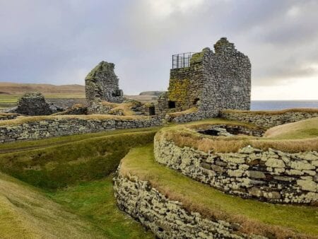 The round walls of a wheelhouse below the laird's house, Jarlshof.