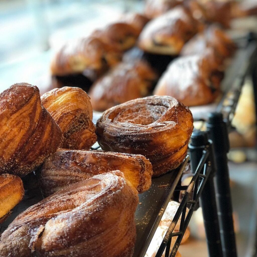 A tray of laminated pastries close up.