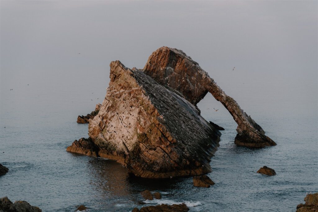 https://hiddenscotland-gallery.ams3.cdn.digitaloceanspaces.com/wp/2022/04/Bow-Fiddle-Rock-8-1024x683.jpg