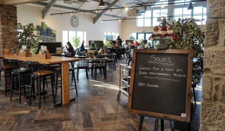 Marshall's restaurant, timber tables in a bright room of brick and stone.