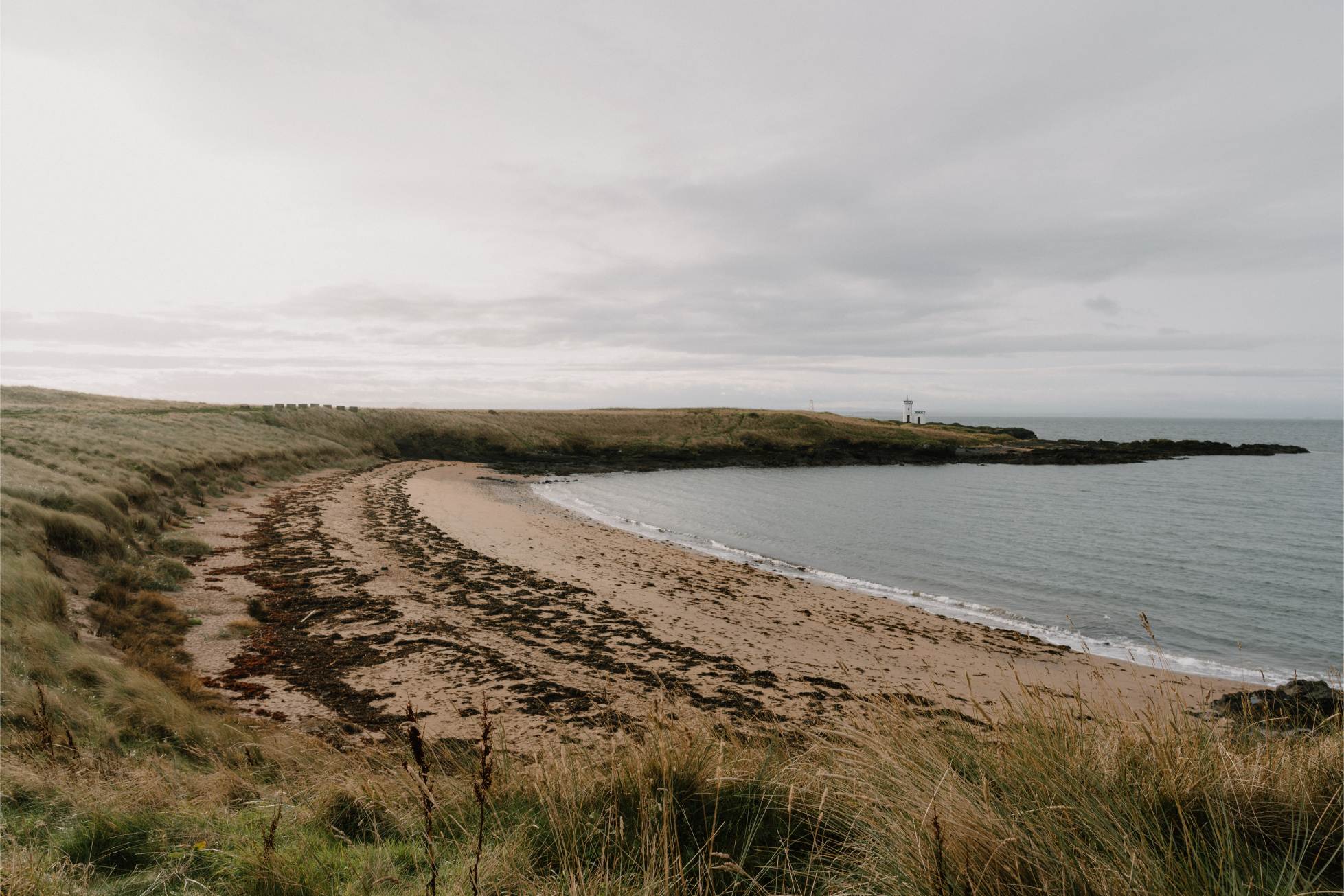 https://hiddenscotland-gallery.ams3.cdn.digitaloceanspaces.com/wp/2025/01/RubyBay&ElieNessLighthouse3-large-1737748368.jpg