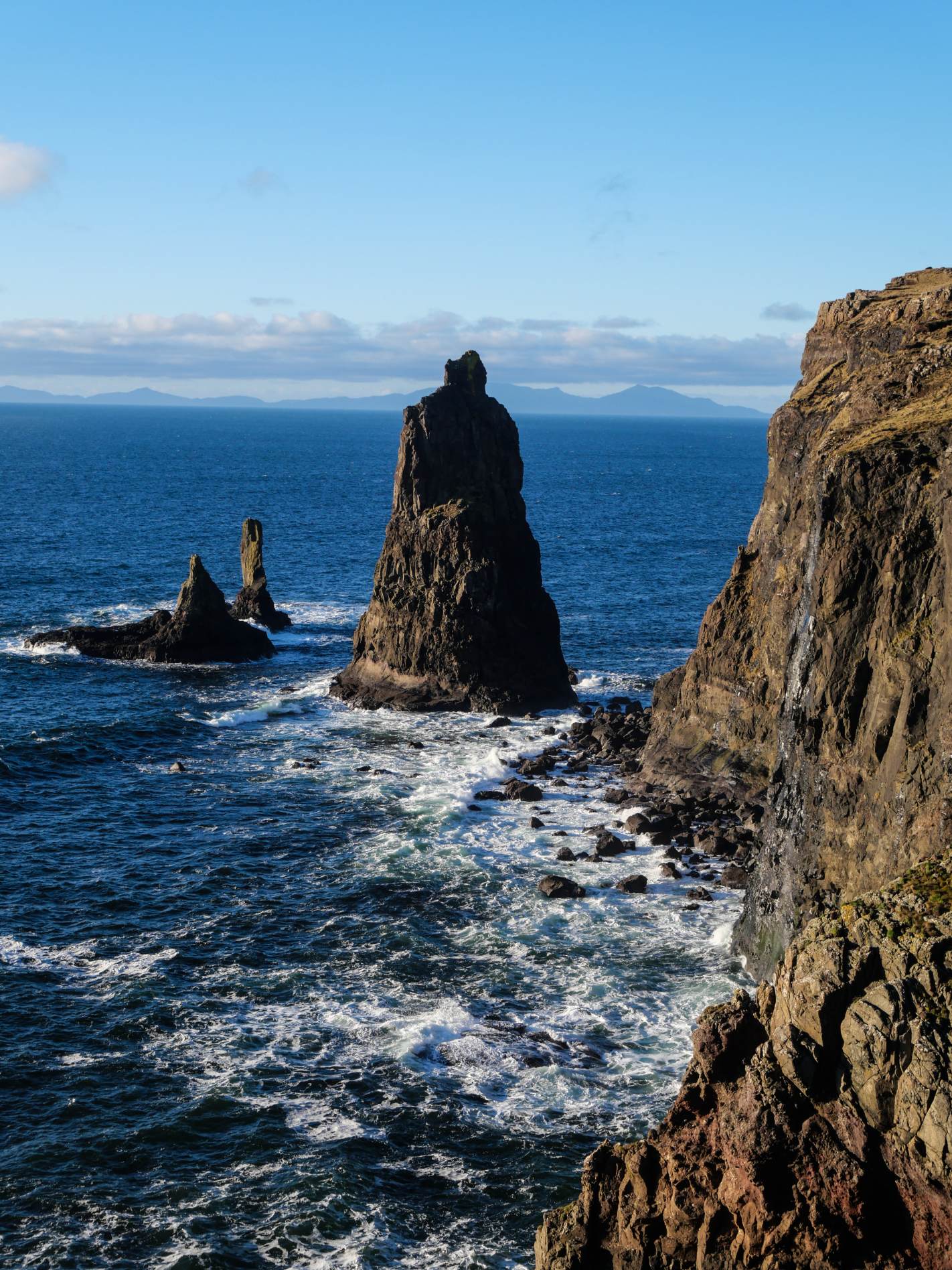The tallest of MacLeod's Maidens rising sheer from the water below the cliffs of Idrigill Point.