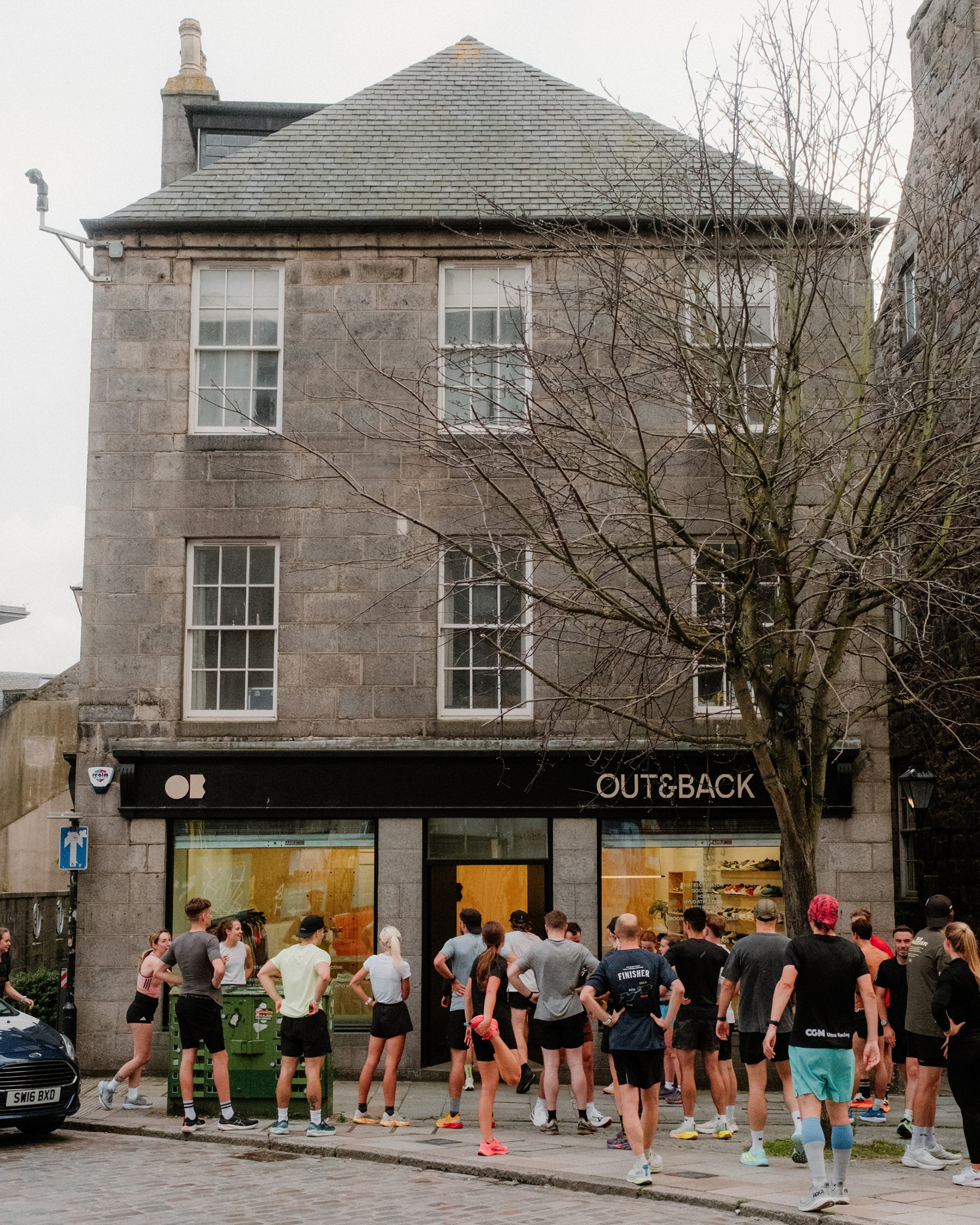 Runners gathered at the door of Out & Back's granite shopfront in Aberdeen.