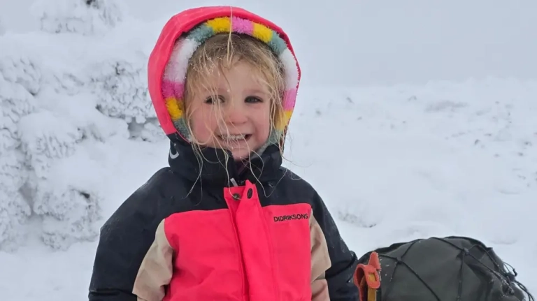 Faye, 5, battles snow and ice to reach the top of Ben Nevis